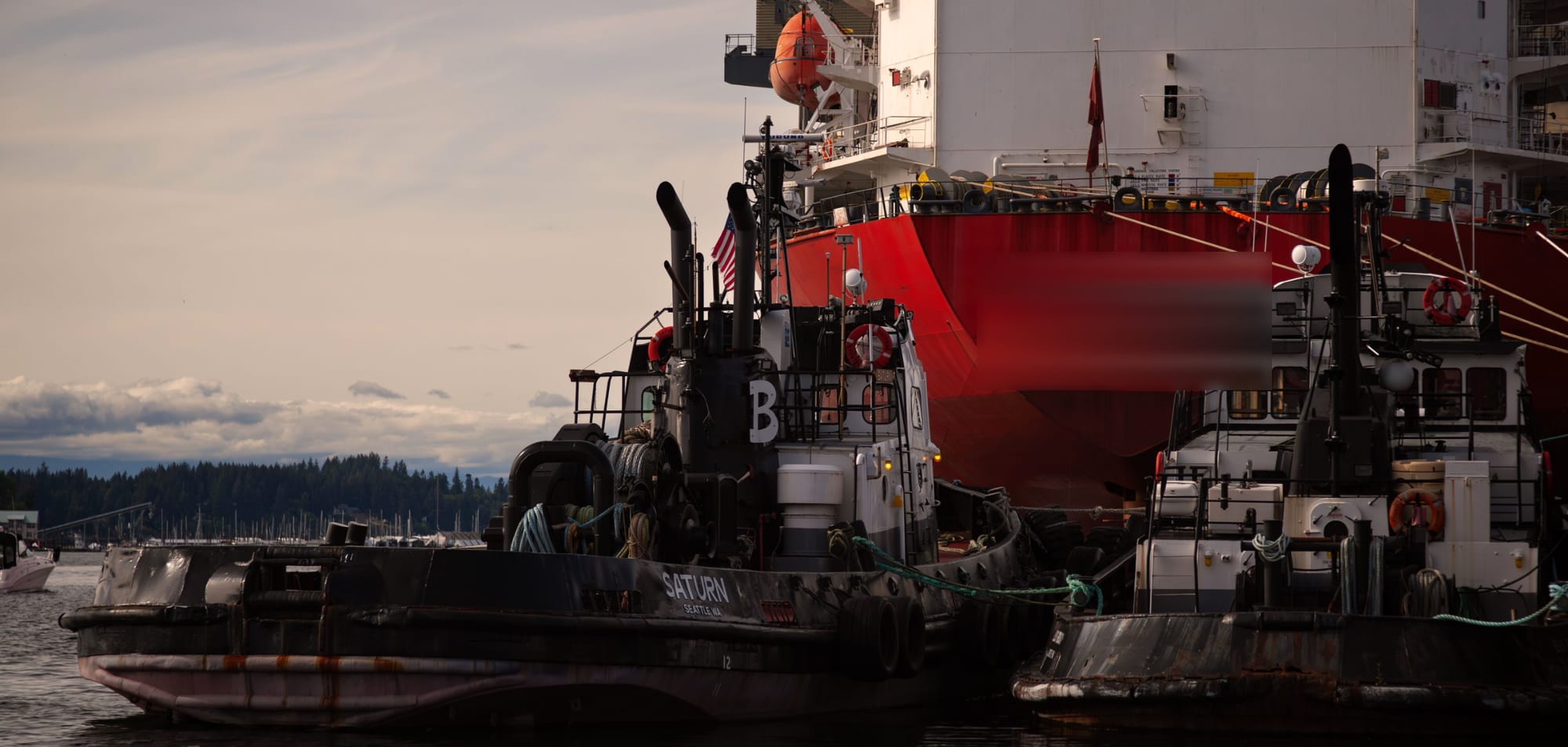 Tugs and tanker